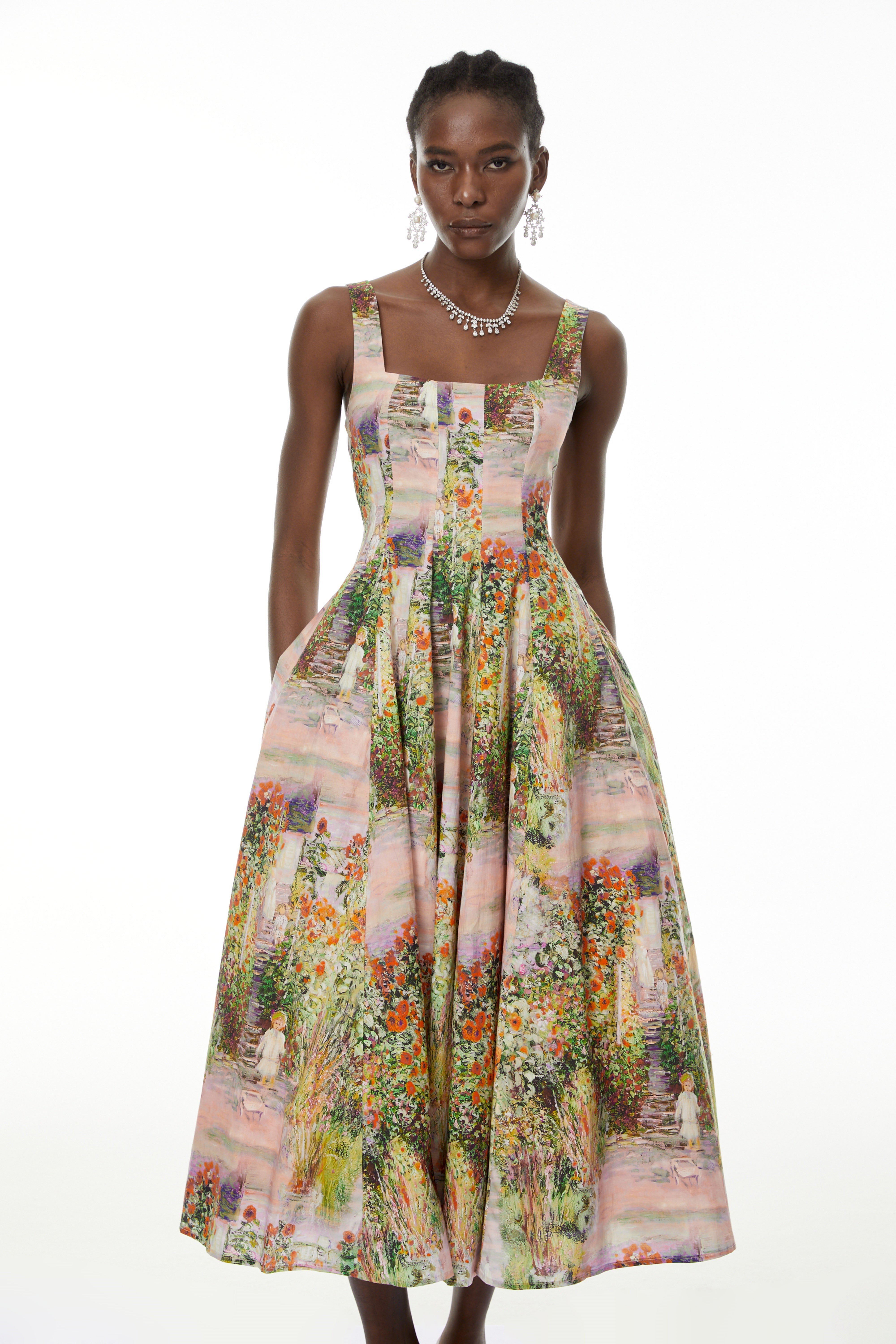 فستان ميدي واسع بأزهار وردية من Adelheid