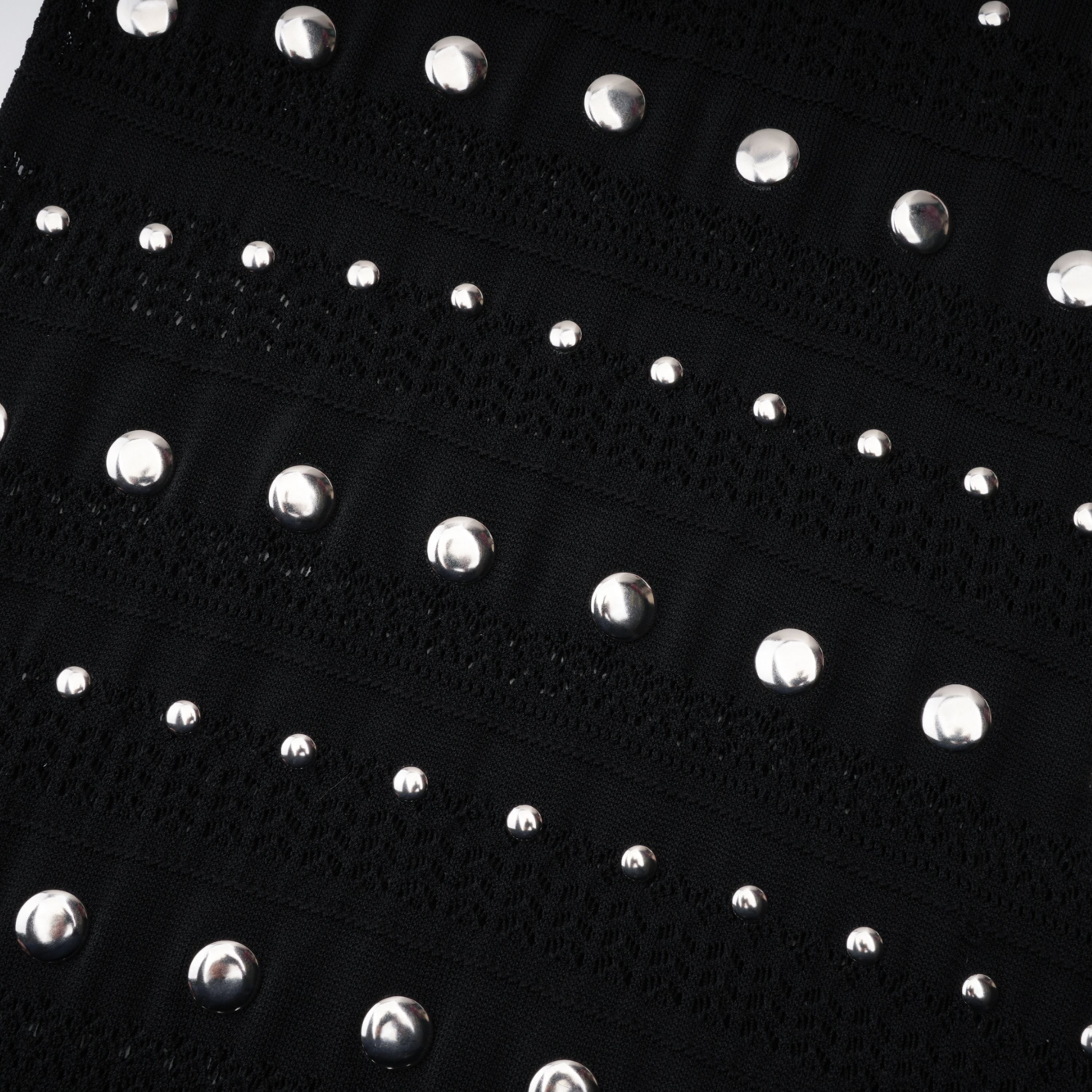 فستان ميدي طويل الأكمام من Chloé باللون الأسود ومزين بالكروشيه