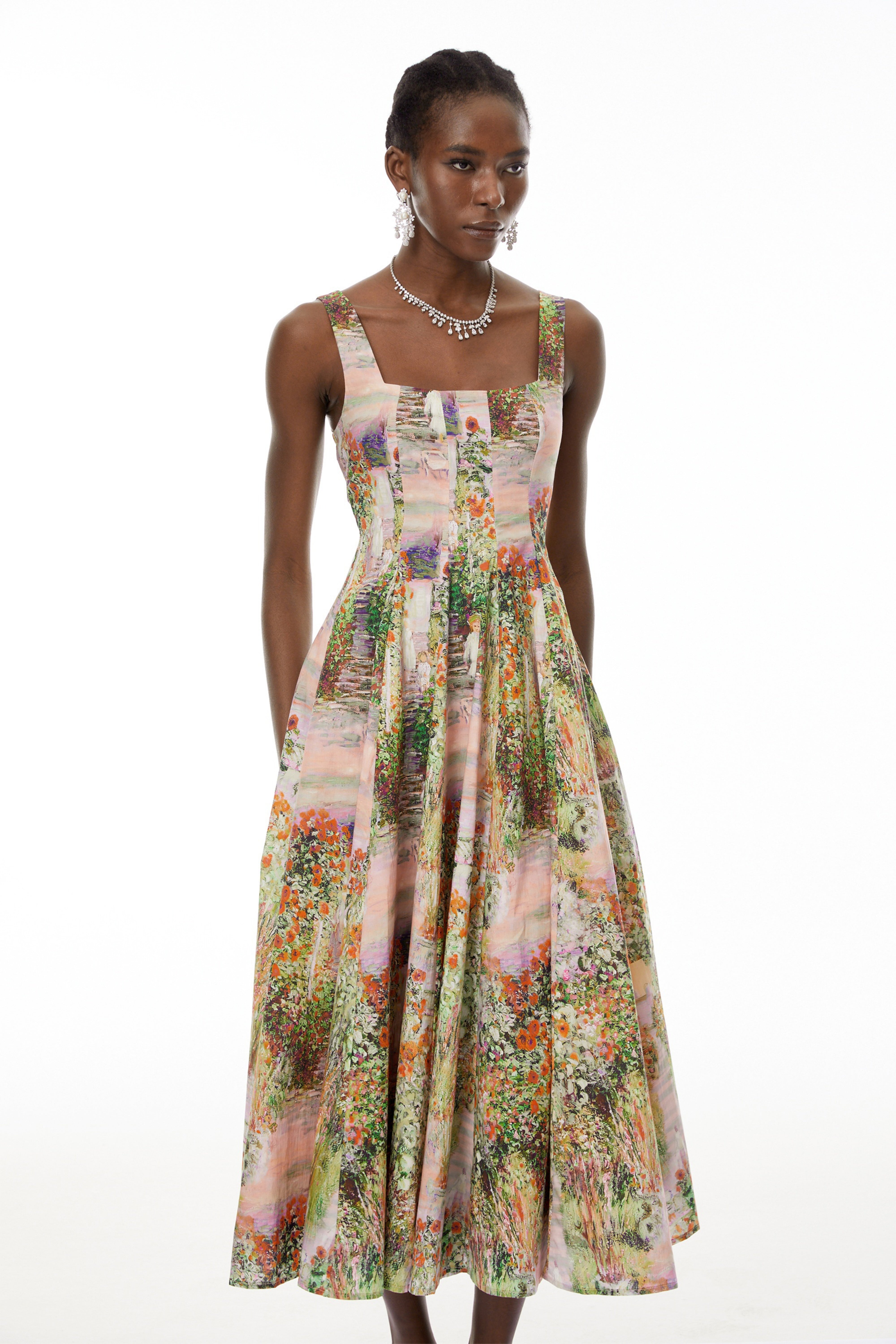 فستان ميدي واسع بأزهار وردية من Adelheid