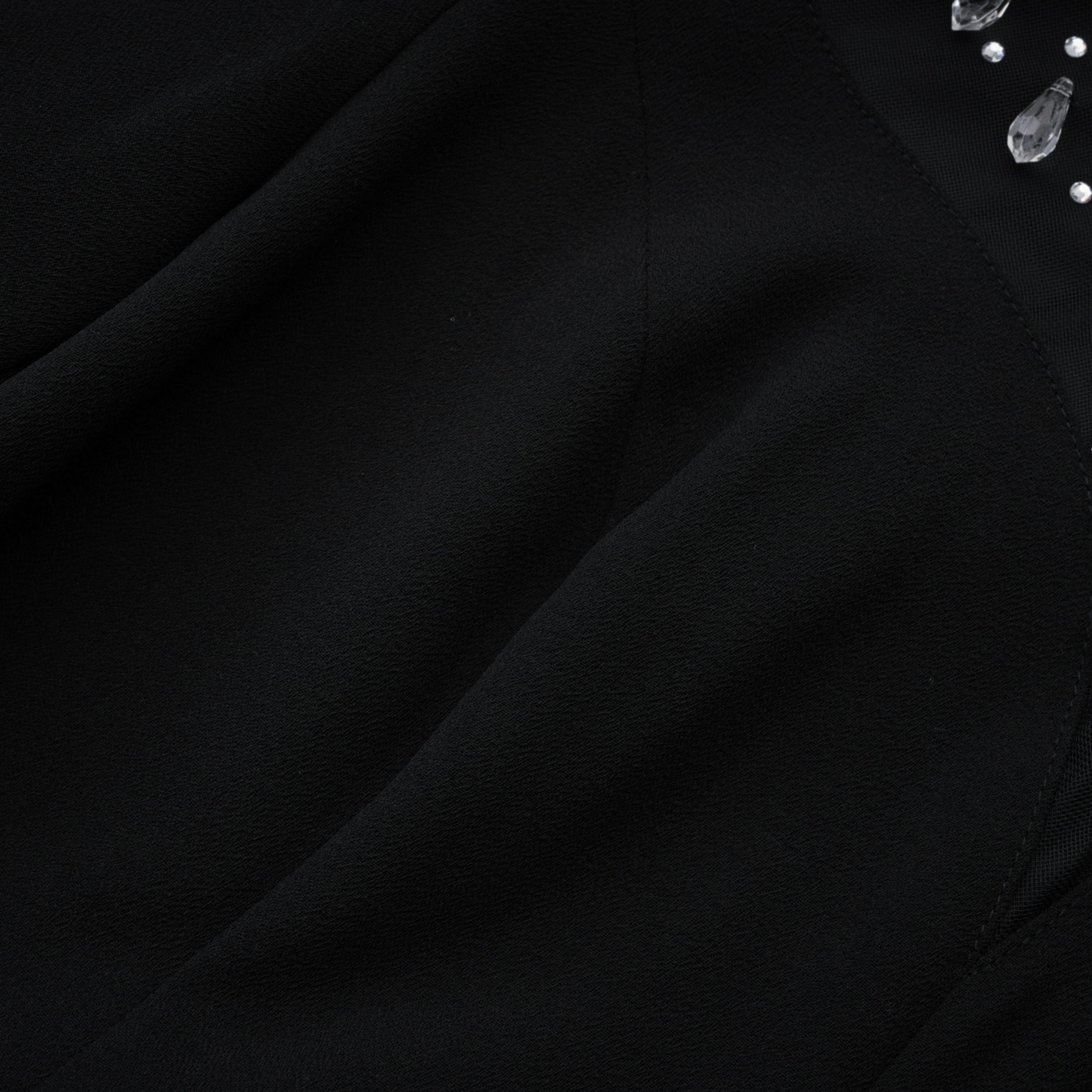 فستان طويل واسع مزين باللون الأسود من Oona