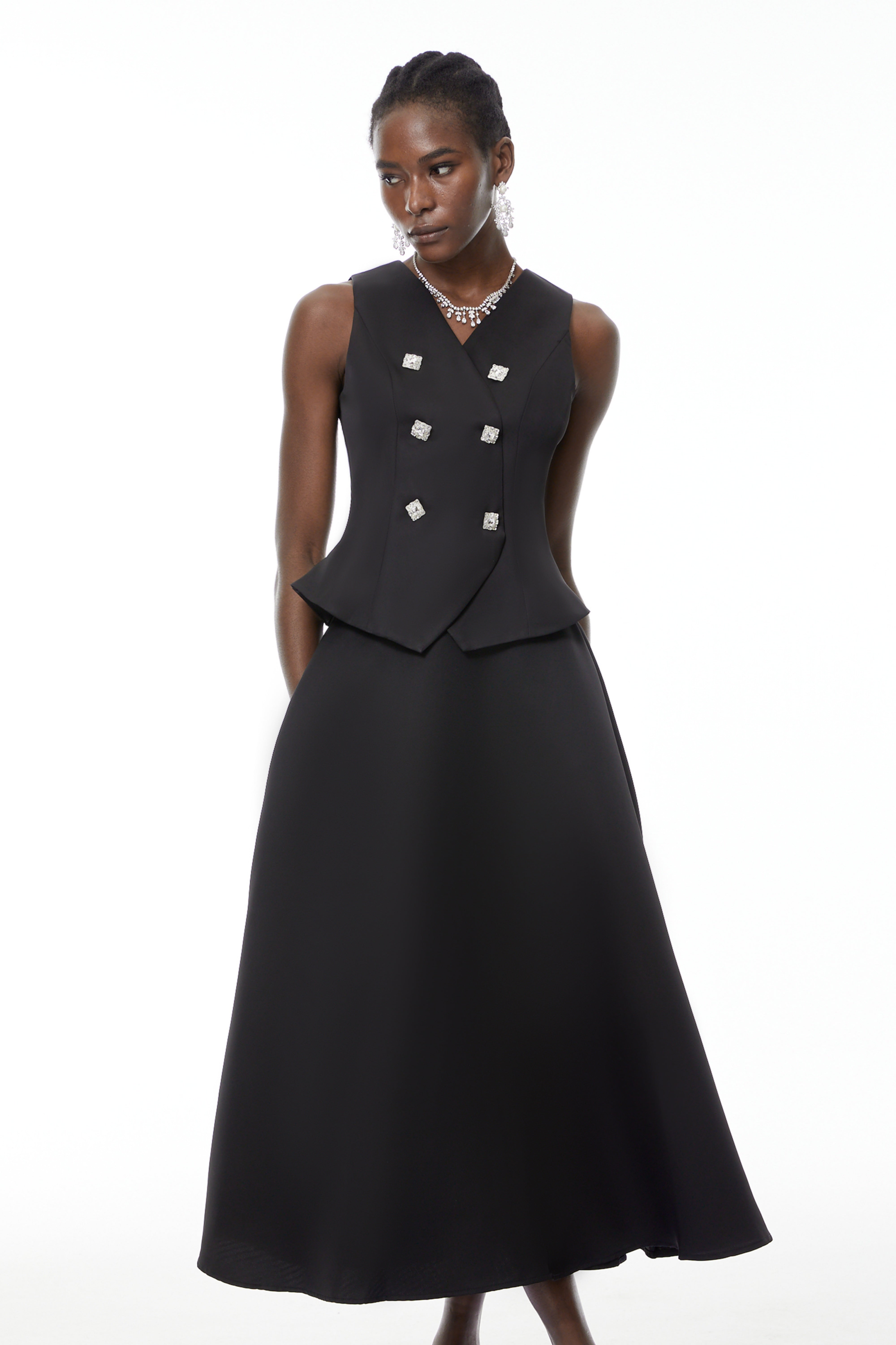 طقم بلوزة وتنورة مزينة باللون الأسود من Wilhelmine